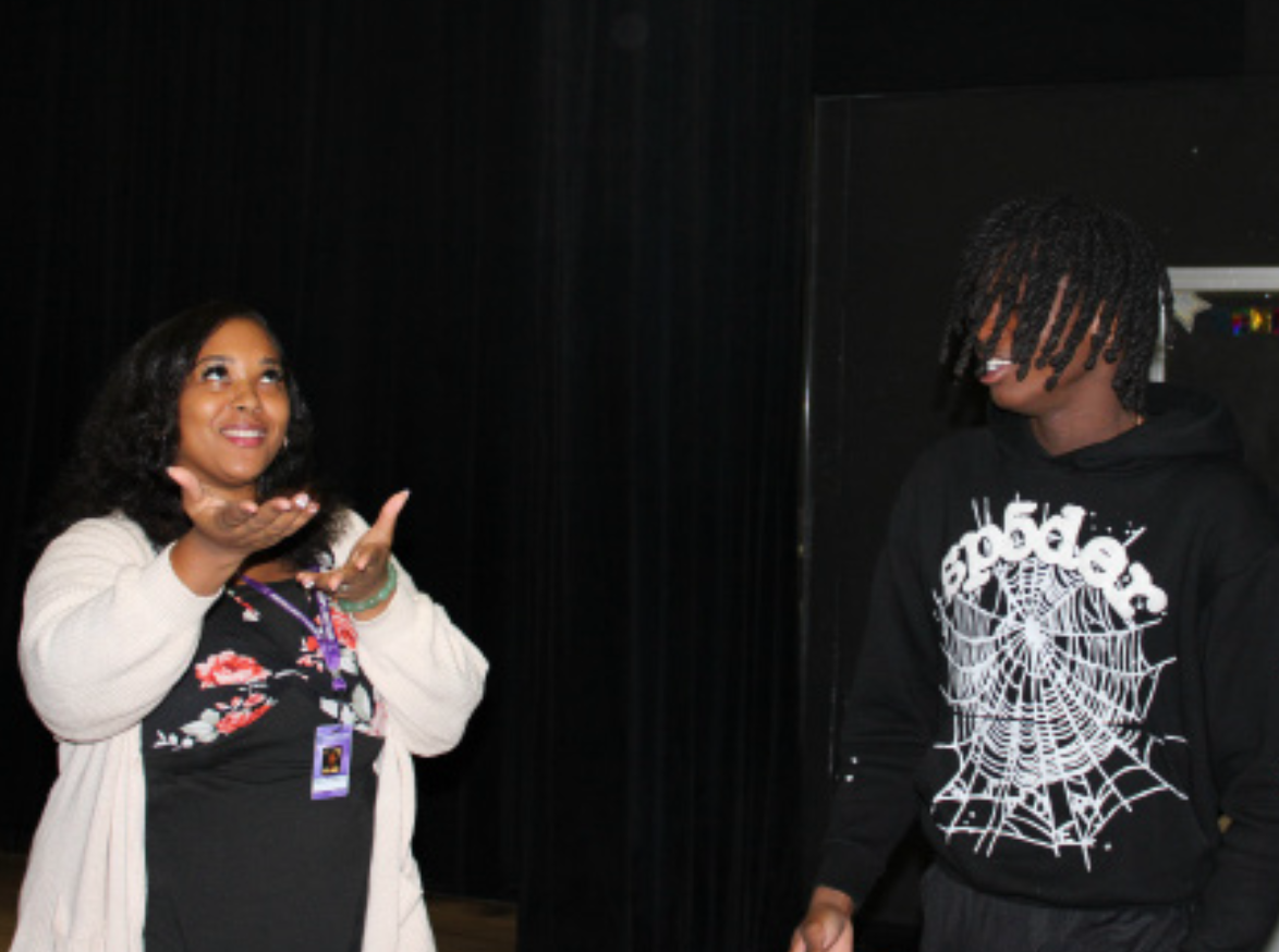 LIGHTS, CAMERA, ACTION: Drama Teacher La-Sheba Williams instructs
senior Jason Davis on how he should always be prepared.